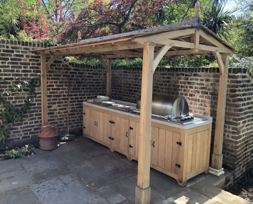 Outdoor kitchen built by Shoots & Leaves in a garden terrace